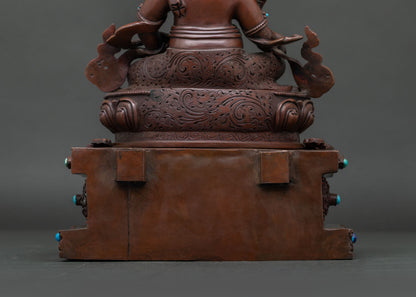 Dzambhala In Ornate Throne Statue | Brown Oxidized Copper Sculpture