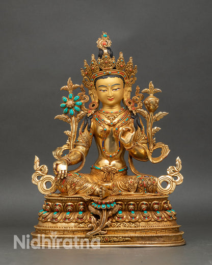 Front view Green Tara statue handcrafted in copper with gold fire-gilding and semi-precious stones