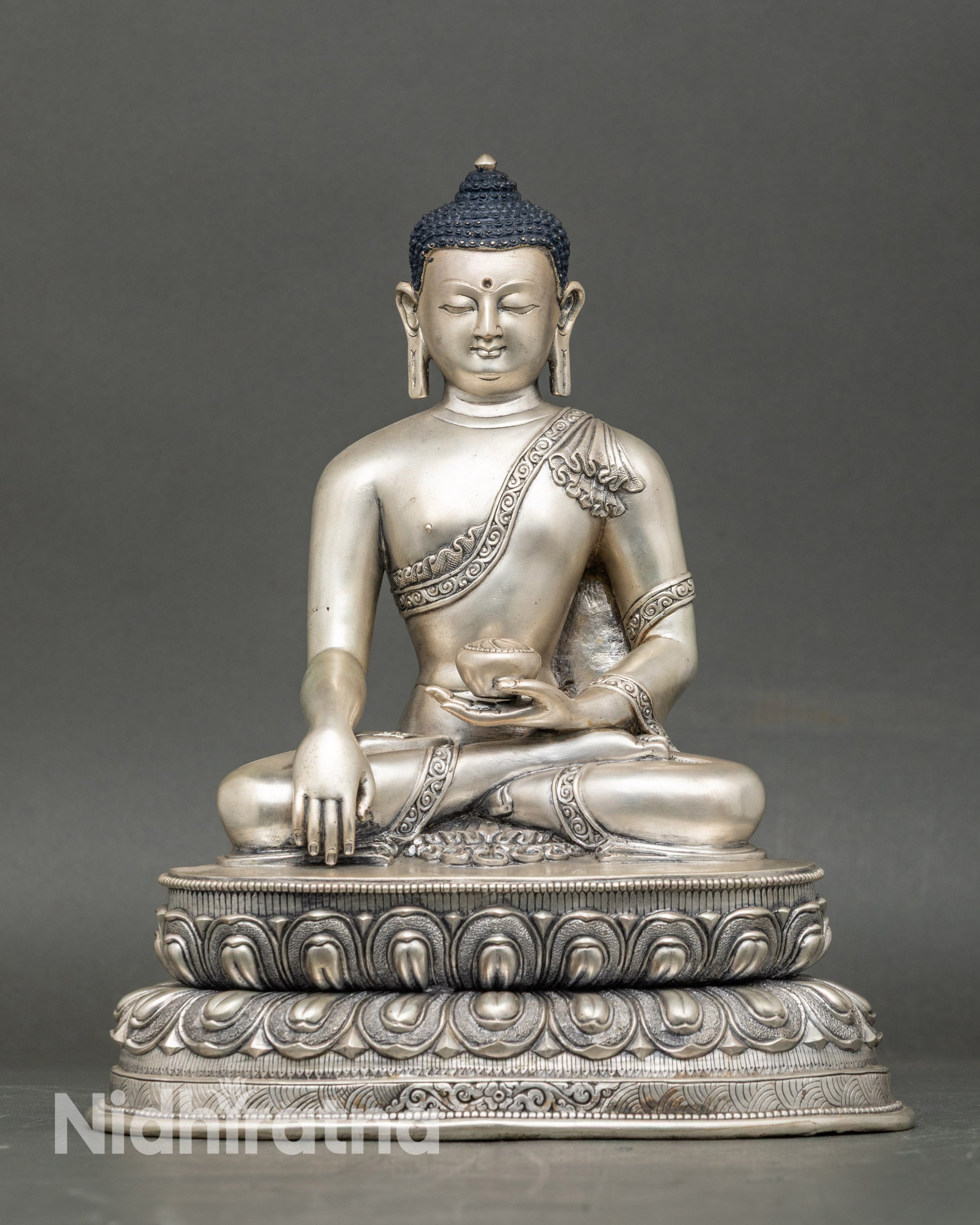 Shakyamuni Buddha statue handcrafted in Patan, Nepal with silver-plated copper
