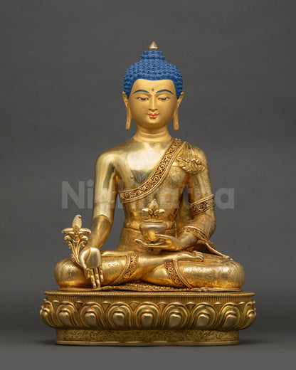 24K gold Medicine Buddha statue front view with lotus seat and myrobalan vase