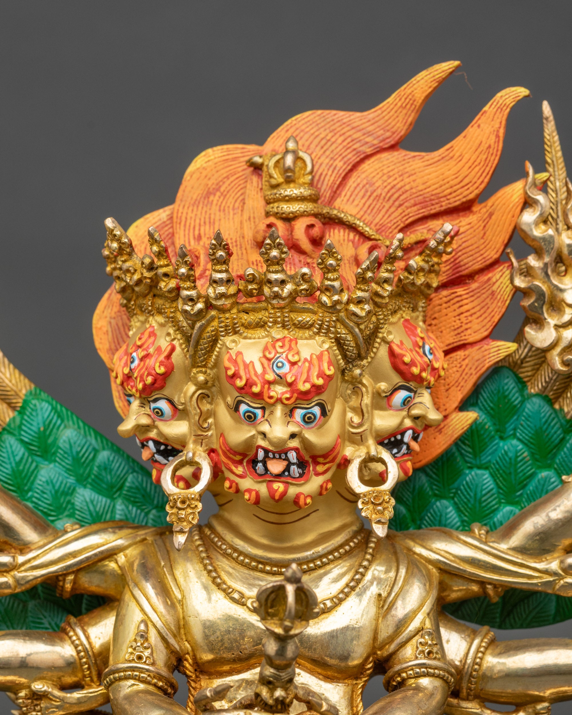 Face close-up of Vajrakilaya Dorje Phurba, wrathful protector deity, gold-painted details