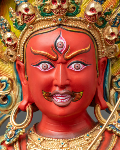 Face close up of Kurukulla with semi wrathful expression and flaming hair details