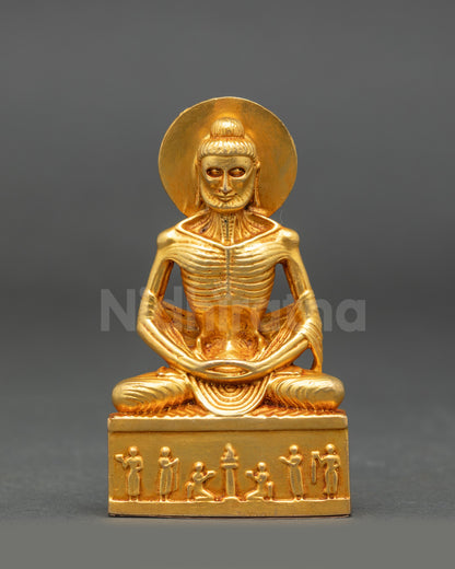 Fasting Buddha Statue front view gold fire-gilded face seated on lotus in ascetic posture