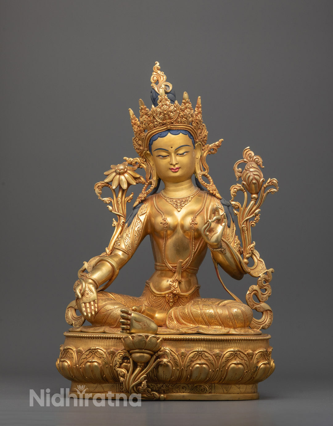 Font-view of Hand-carved Green Tara statue with 24k gold gilded face, seated on lotus throne