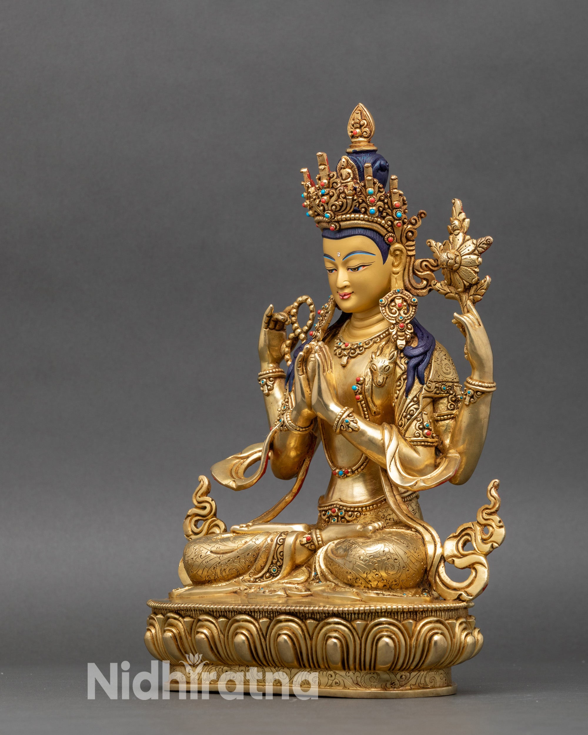  Four-armed Chenrezig left side with ornamental robe patterns and semi-precious stones