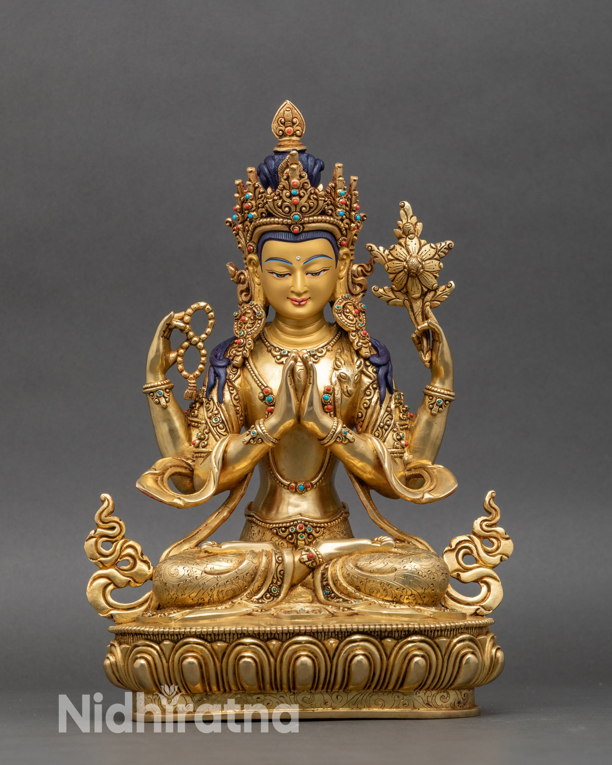 Four-armed Chenrezig meditation statue with gold fire-gilded copper and lotus pedestal