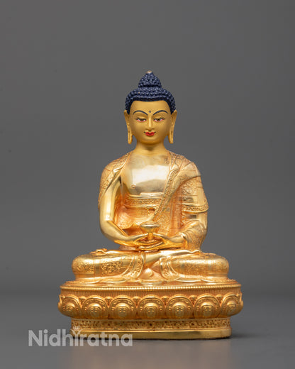 Front-facing Amitabha Buddha Statue seated on lotus base with peaceful expression and alms bowl 