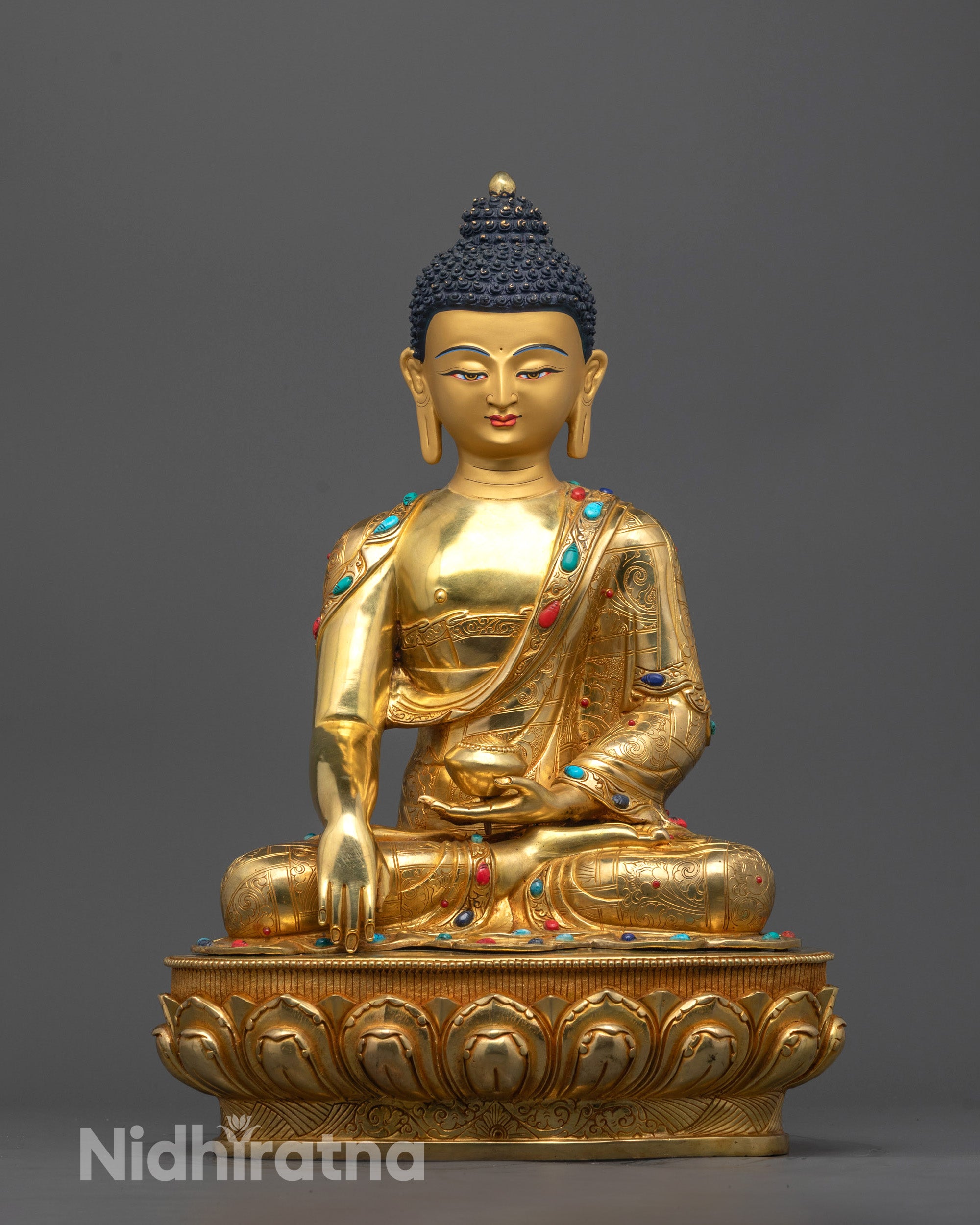 Front-facing Shakyamuni Buddha Statue hand-carved in Nepal with 24k gold gilded finish