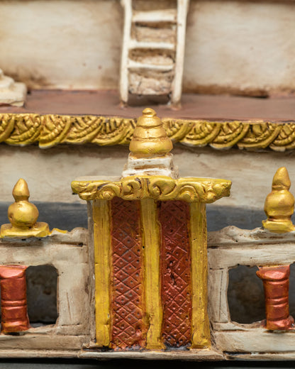 Front gate detail of Boudhanath Stupa replica with intricate painted design