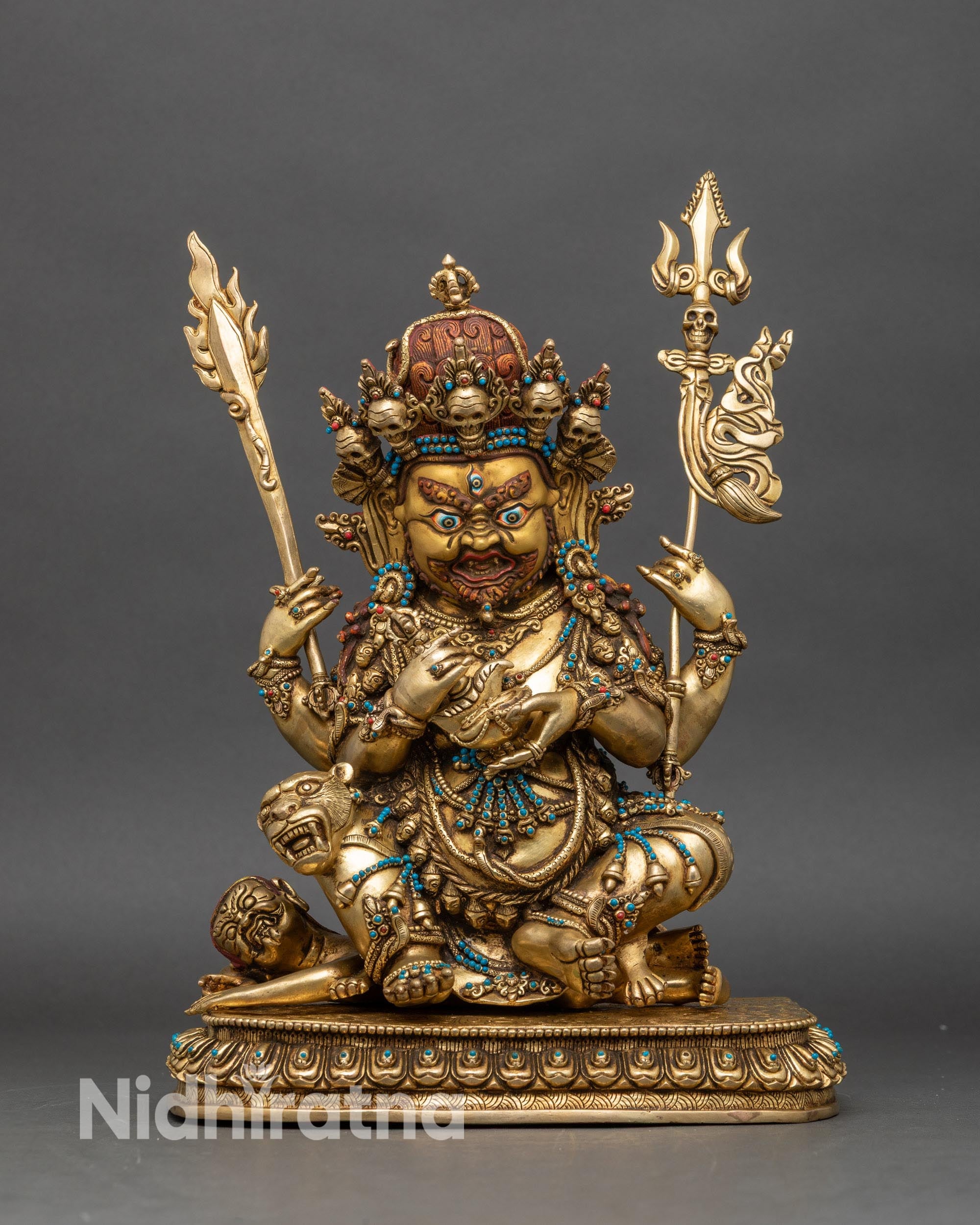 Front view of Four-Armed Mahakala Statue, copper and gold fire-gilded Tibetan protector