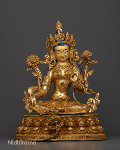 Front view of Green Tara statue gold-painted face coral turquoise stones double lotus Nepal