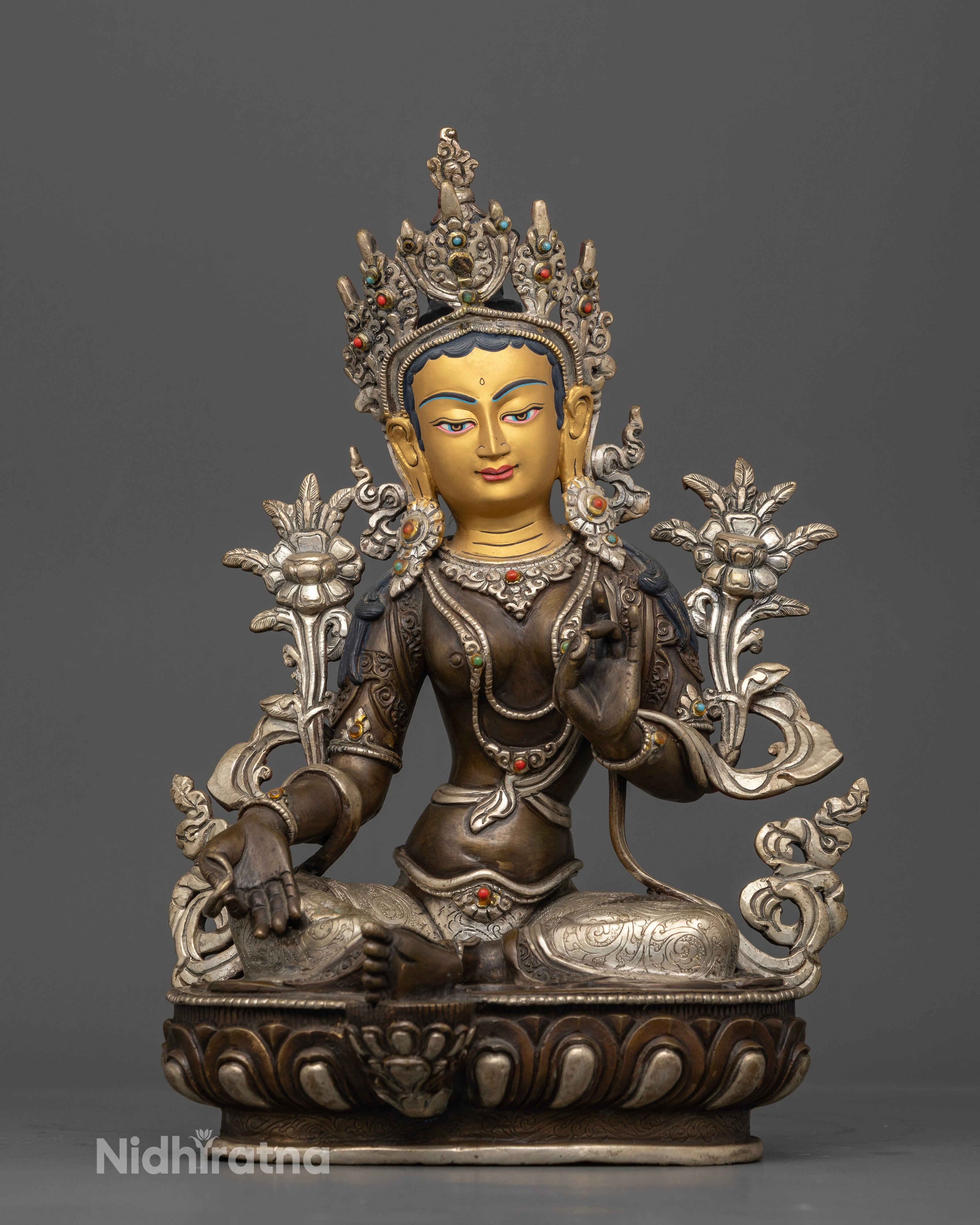 Front view of Green Tara statue gold-painted face oxidized silver-plated copper double lotus Nepal