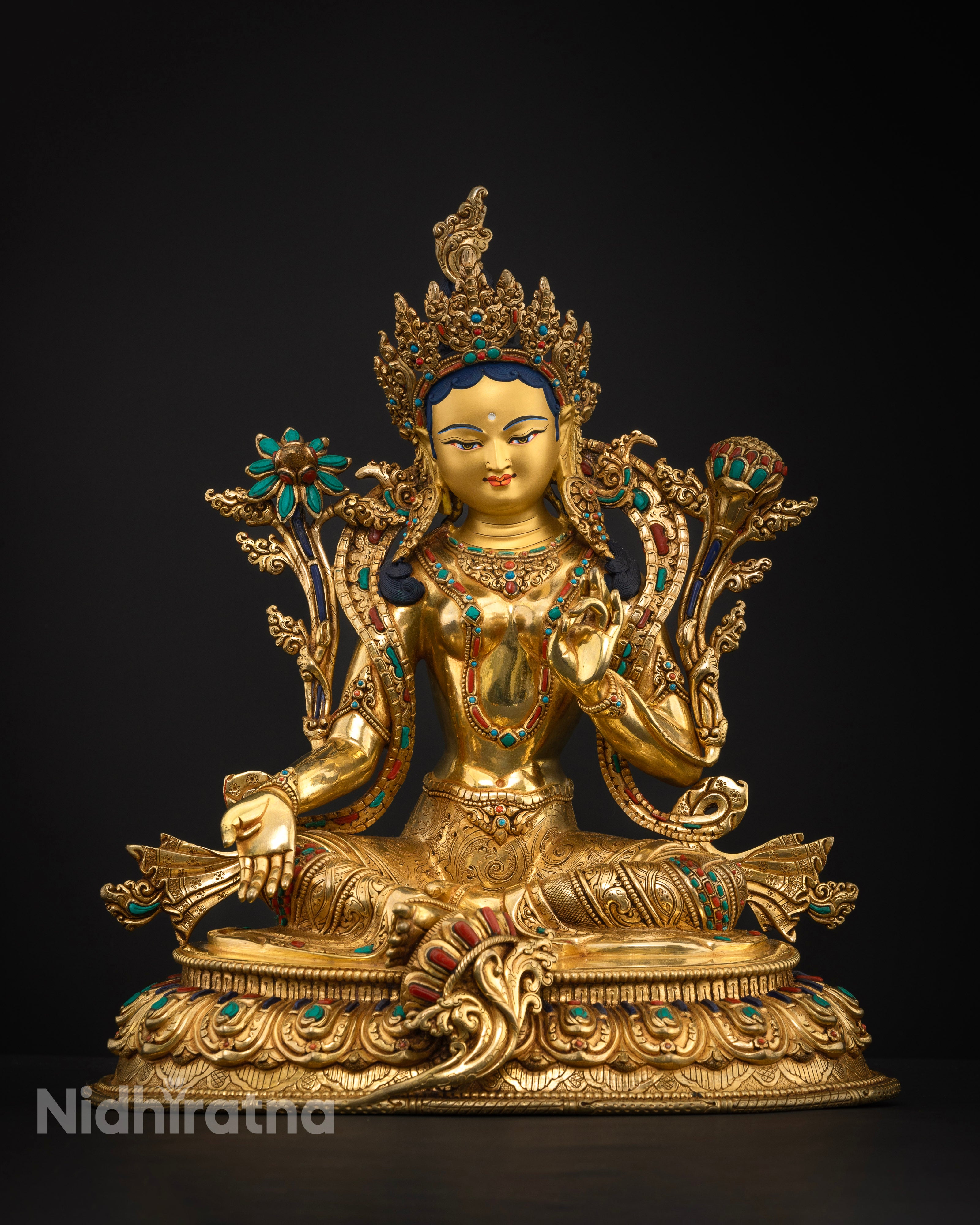 Front view of Green Tara statue handcrafted Newari artisan Patan Nepal 24k gold gilded copper