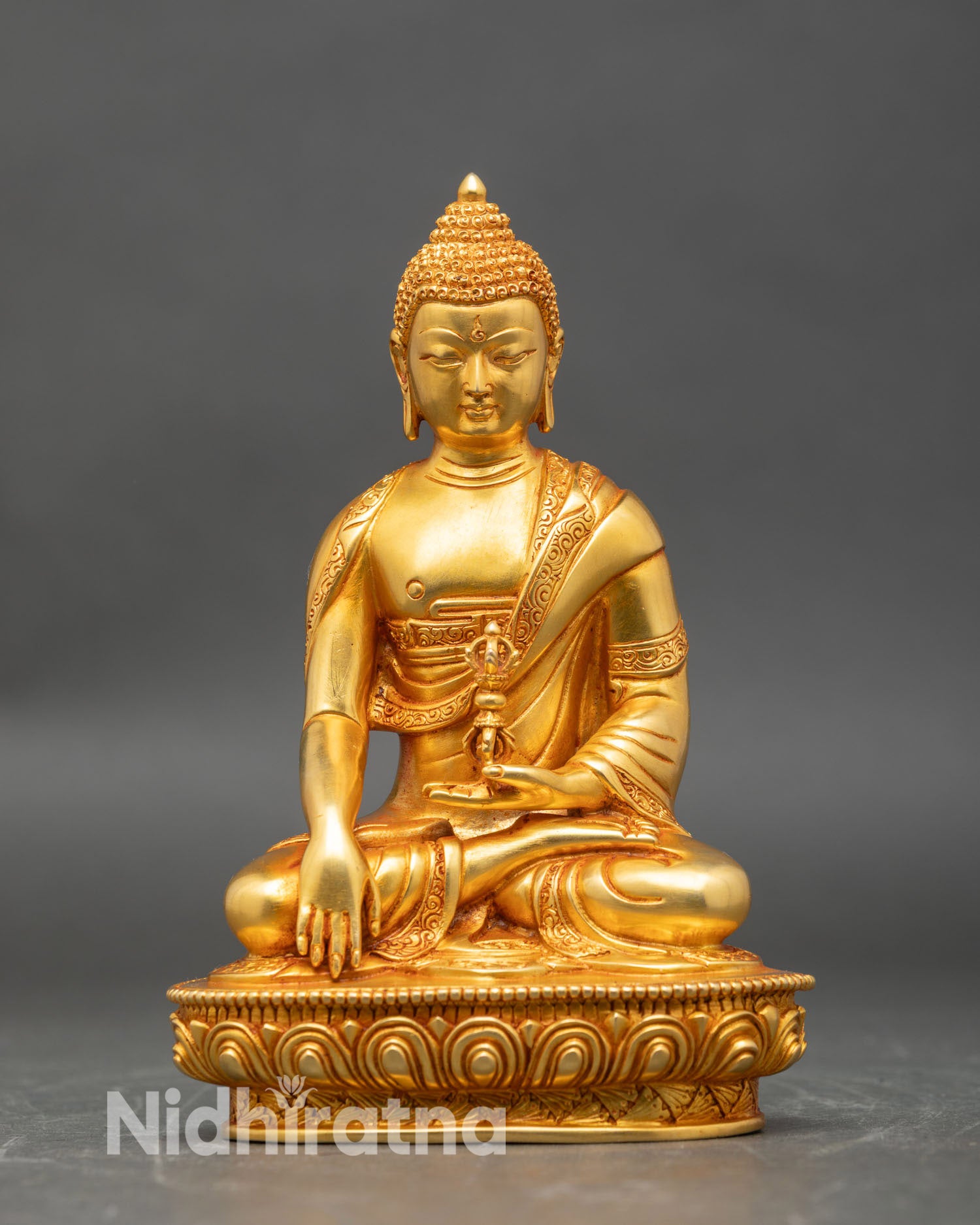Front view of Mitrugpa gold-gilded copper statue, holding vajra Tibetan wrathful deity