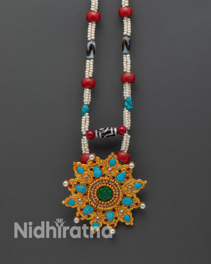 Front view of Tibetan Ghau Mala Necklace hand-carved 24k gold-plated beads turquoise coral Dzi emerald ruby