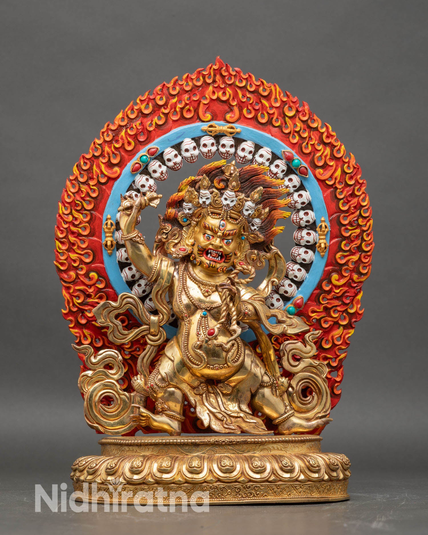 Front view of Vajrapani gold gilded copper statue holding Vajra and lasso Himalayan art