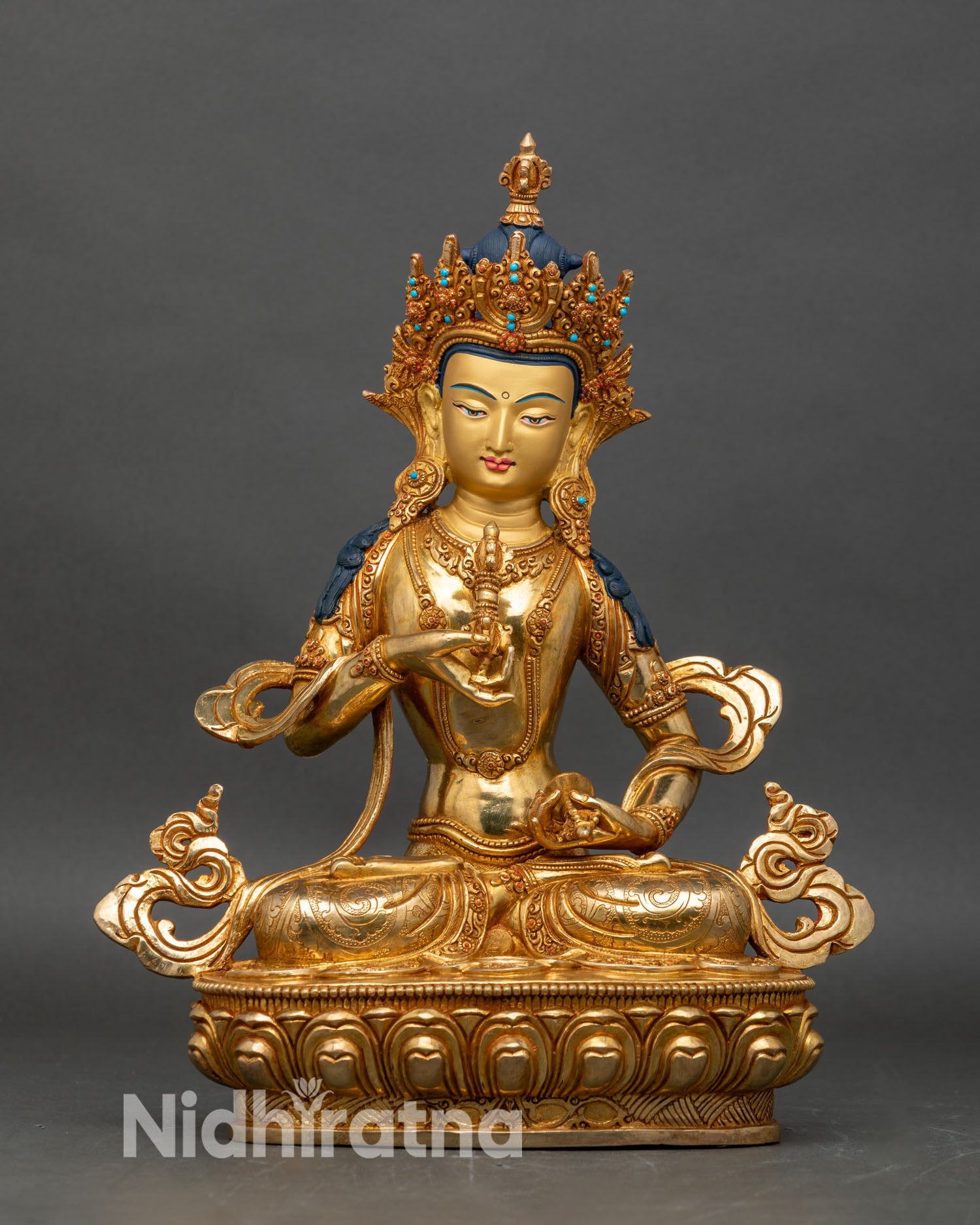Front view of Vajrasattva gold gilded copper statue, holding vajra and bell Himalayan art