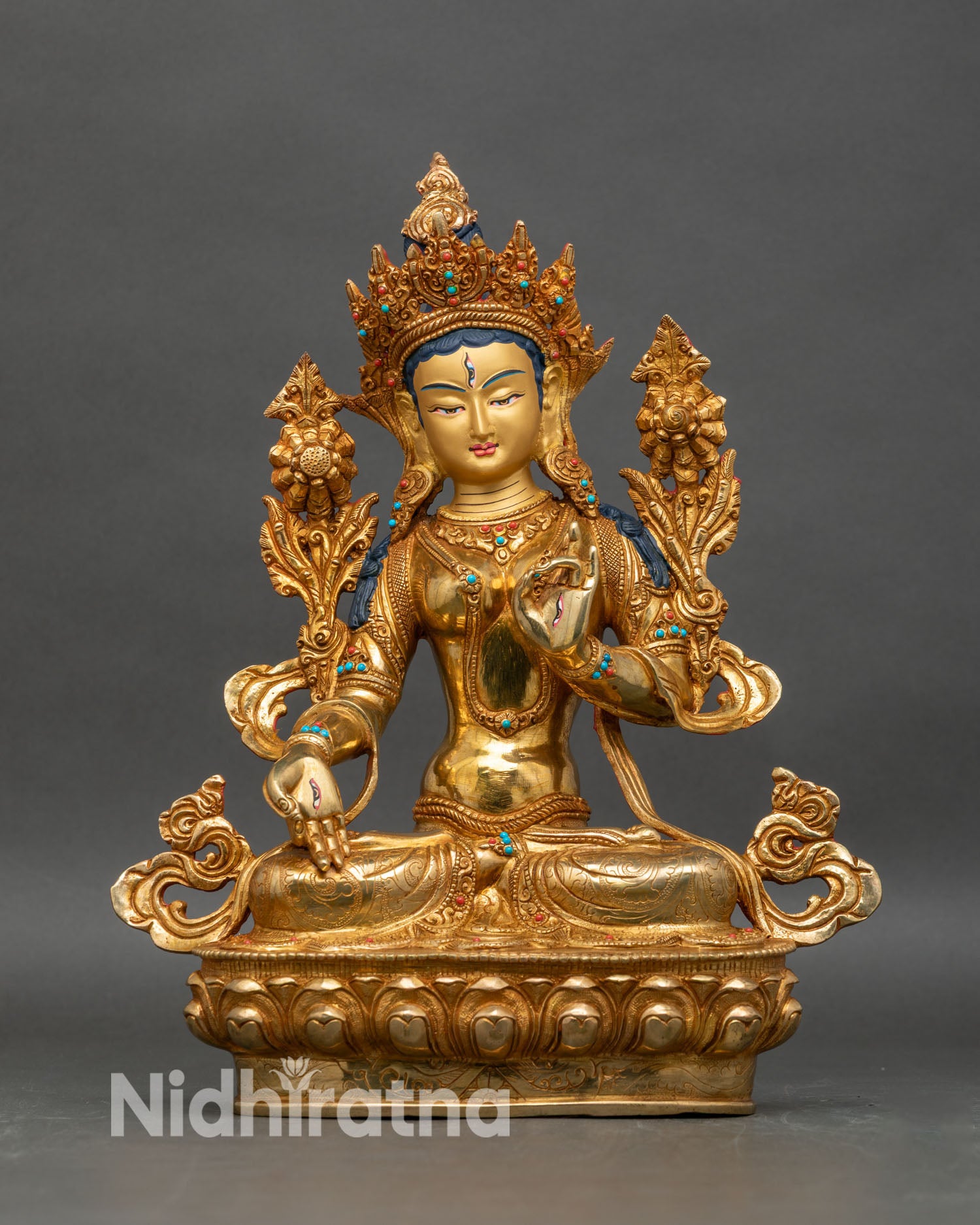 Front view of White Tara statue, handcrafted Nepalese Buddhist art with gold gilding