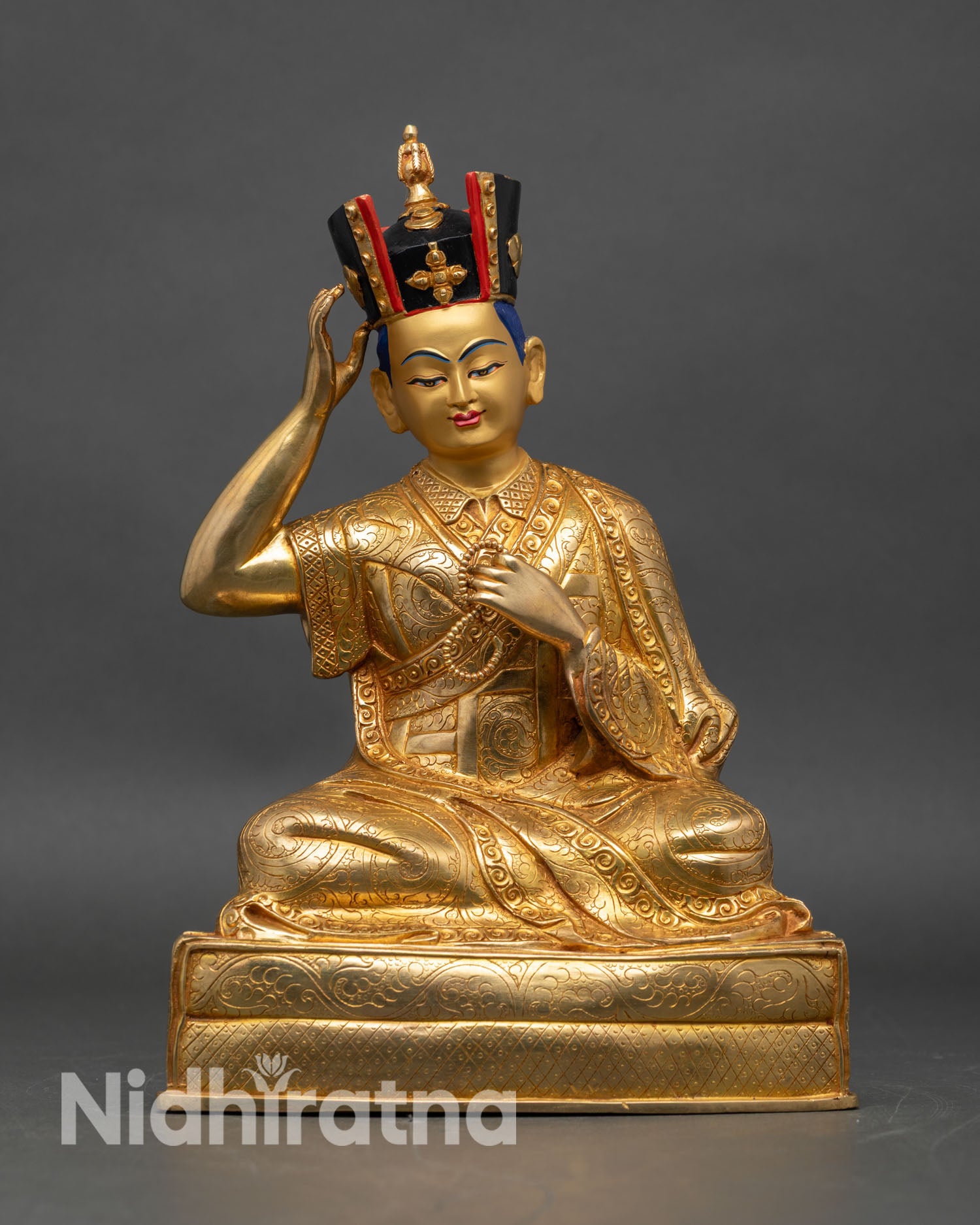 Front view of 16th Karmapa Rangjung Rigpe Dorje Statue handcrafted copper 24K gold gilded moon disc lotus seat