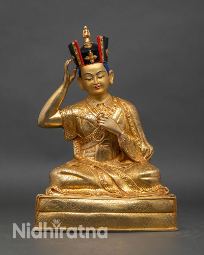 Front view of 16th Karmapa Rangjung Rigpe Dorje Statue handcrafted copper 24K gold gilded moon disc lotus seat