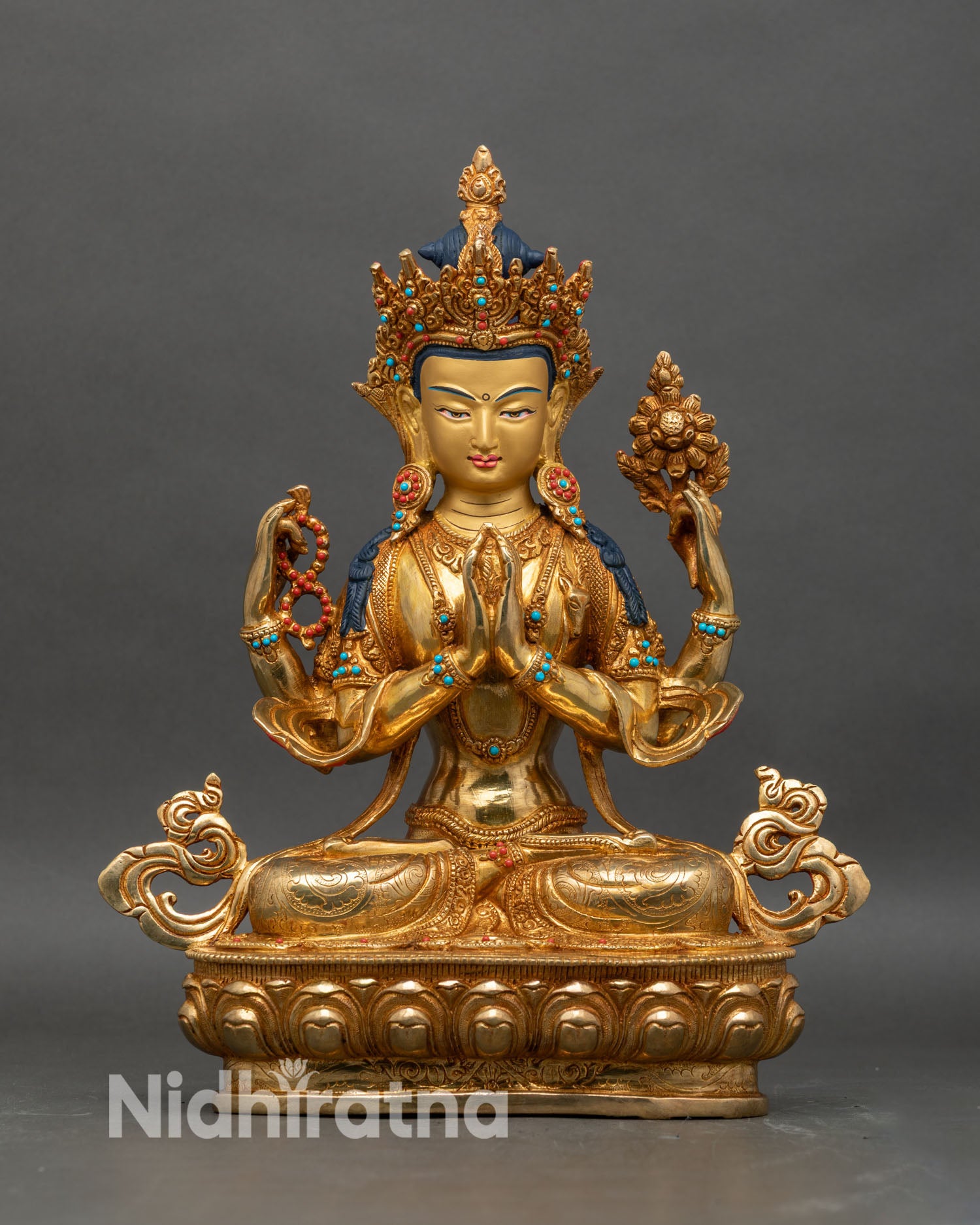 Front view of Four-Armed Avalokiteshvara statue, copper and gold fire-gilded Nepalese art