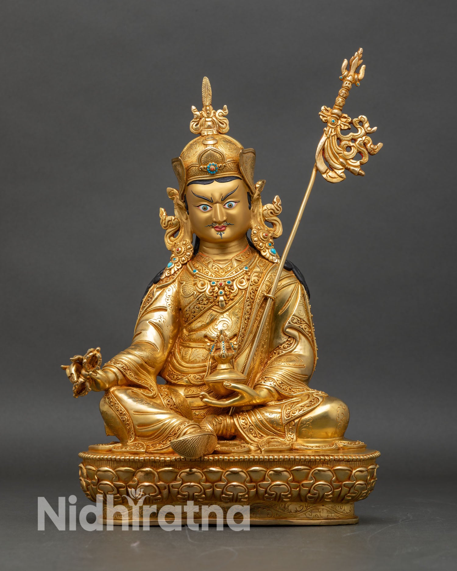 Front view of Guru Rinpoche Padmasambhava Statue handcrafted copper fire-gilded gold turquoise Nepal