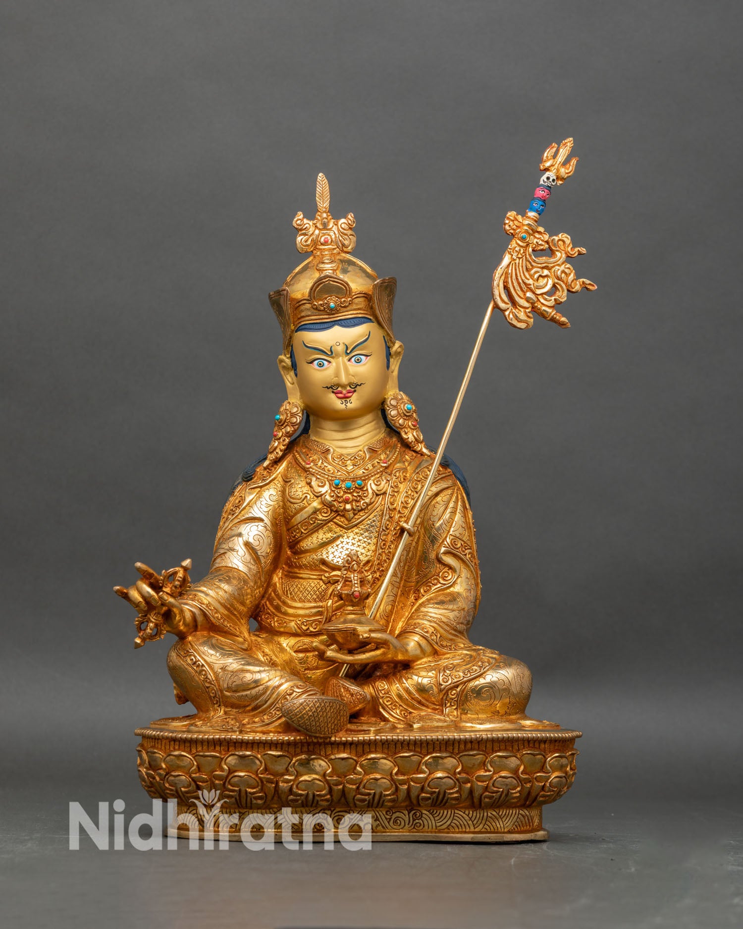 Front view of Guru Rinpoche statue, handcrafted copper with gold gilded details