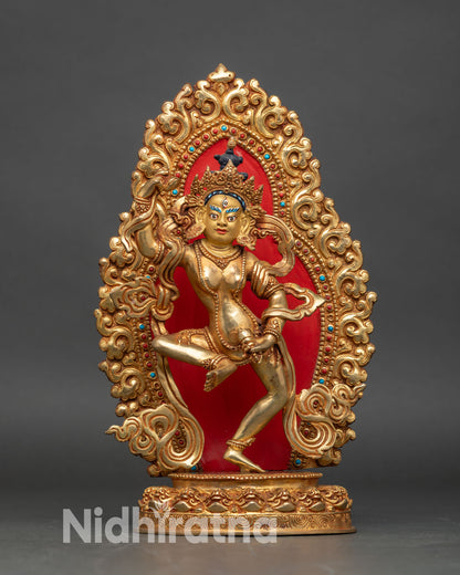 Front view of Machig Labdron Statue gold gilded copper dancing pose moon disc lotus throne coral turquoise stones