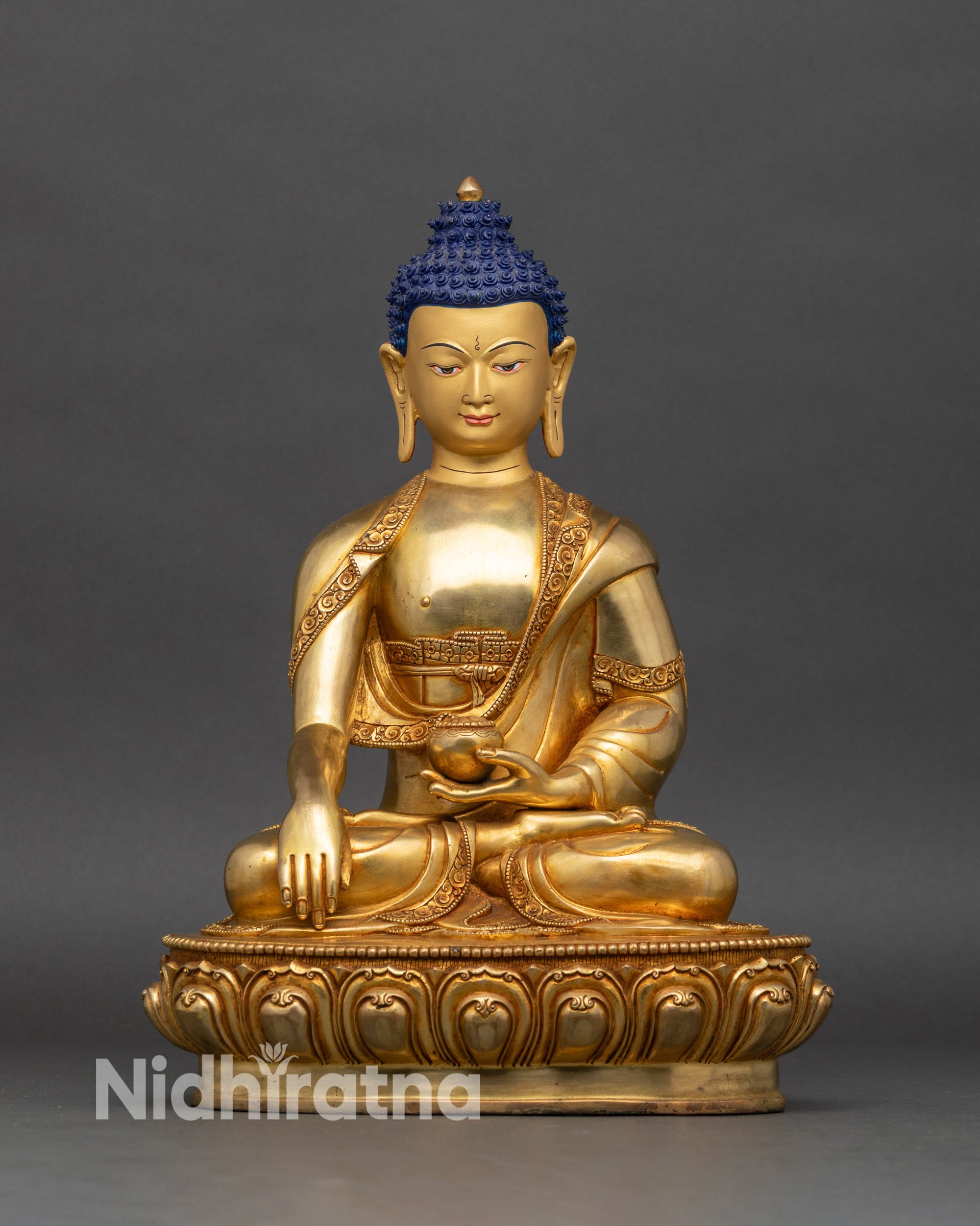 Front view of Shakyamuni Buddha figurine, handcrafted Nepalese copper with 24K gold fire-gilding
