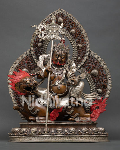 Front view of Vaishravana Namtoshe statue seated on snow lion with victory banner and mongoose