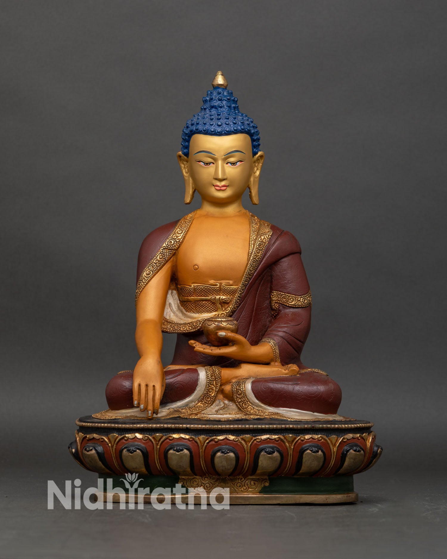 Front view of Shakyamuni Buddha statue, handcrafted copper with gold-painted face