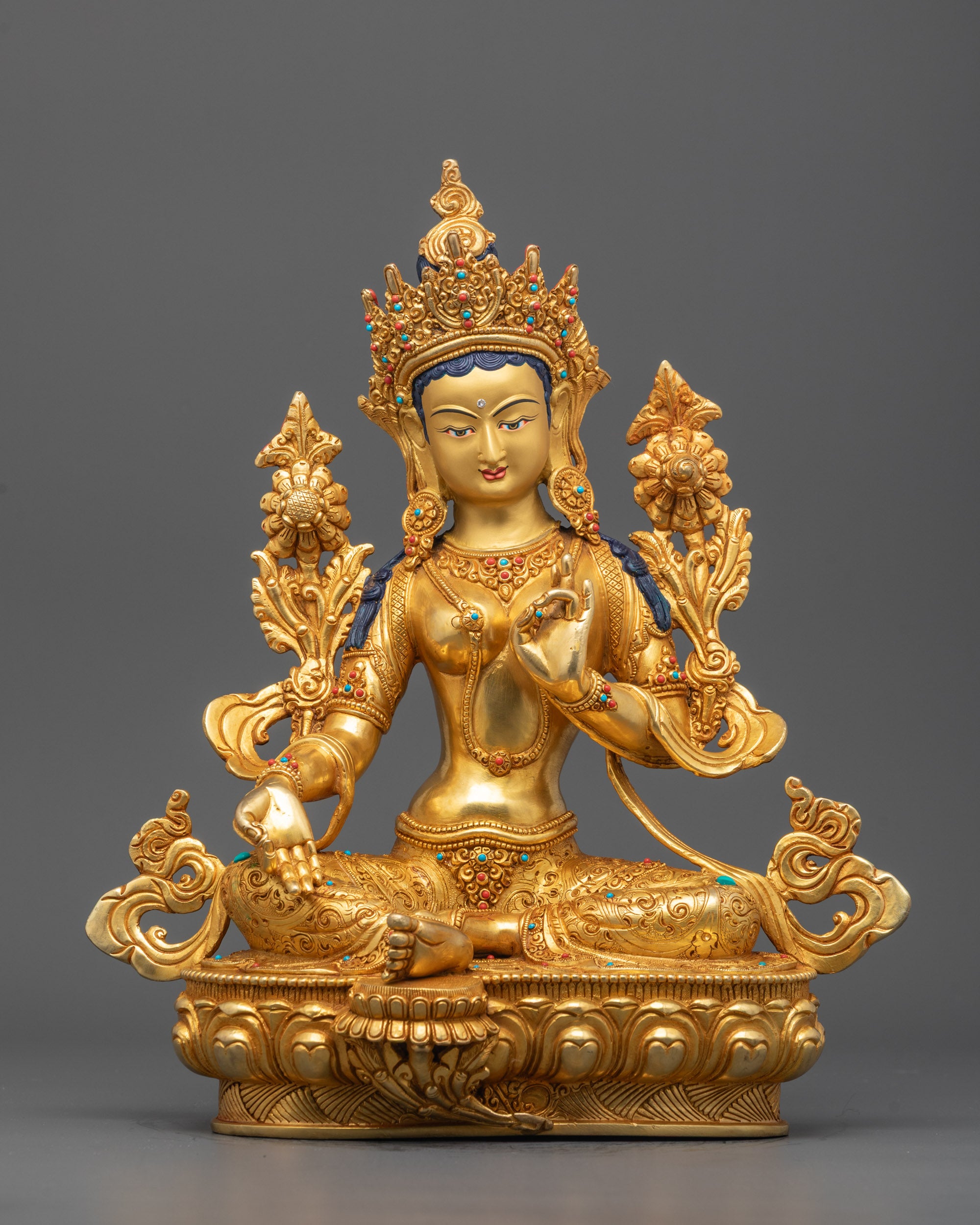 Front-view of Hand-carved Green Tara statue in meditative posture with 24k gold gilding