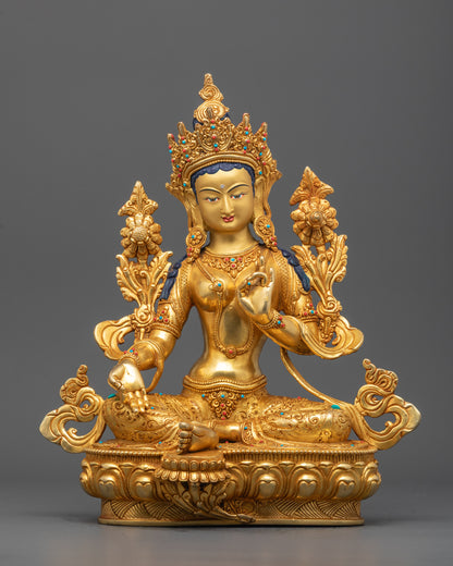 Front-view of Hand-carved Green Tara statue in meditative posture with 24k gold gilding