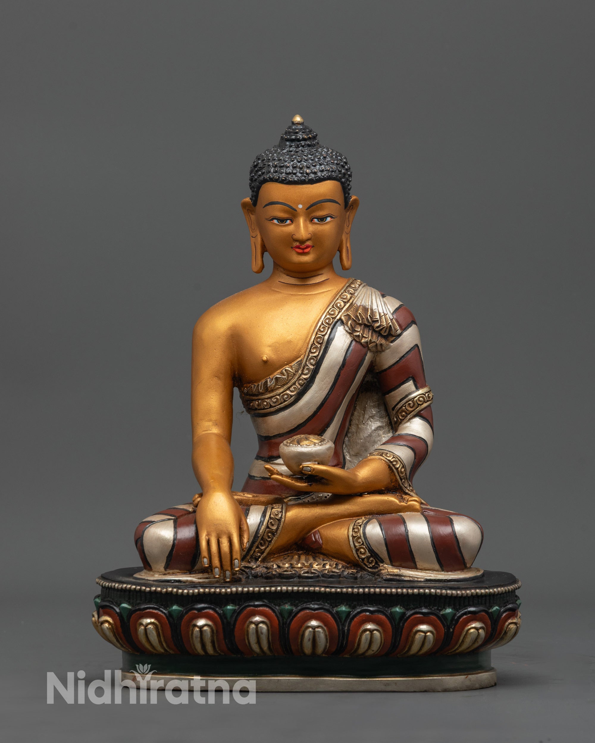 Front-view of Hand-carved Shakyamuni Buddha Statue from Nepal seated on a lotus base