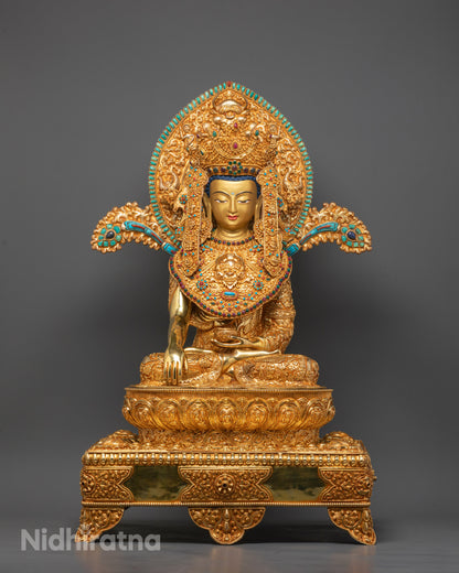 Front-view of Jowo Rinpoche Buddha statue with gold crown seated on lotus throne