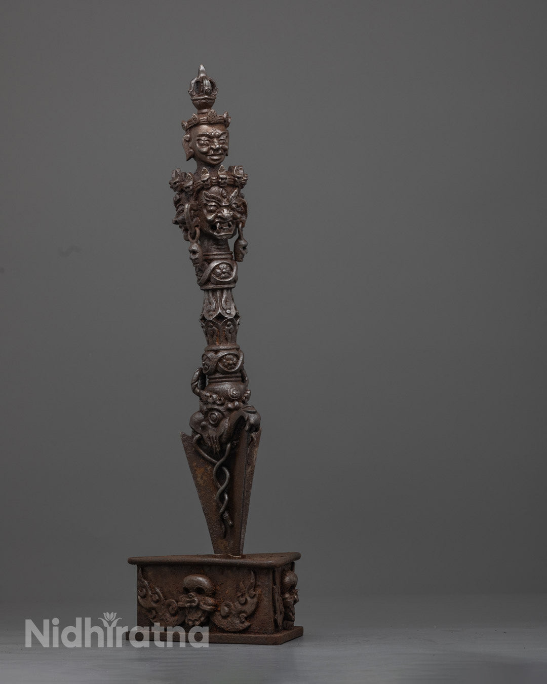 Front-view of Traditional Tibetan Phurba Statue Made from Oxidized Copper