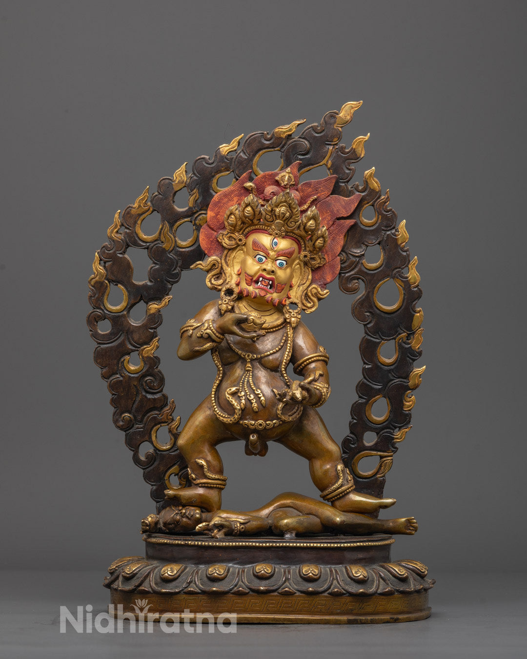 Front View of Hand-Carved Black Dzambhala Statue in Oxidized Copper Standing