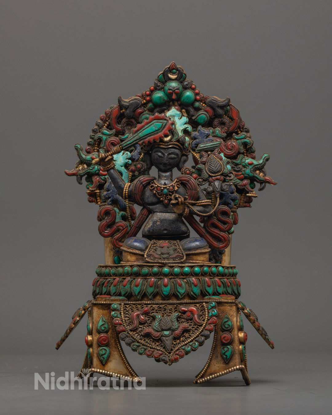 Front View of Hand-Carved Manjushri Statue with Flaming Sword and Lotus on Precious Stone Base