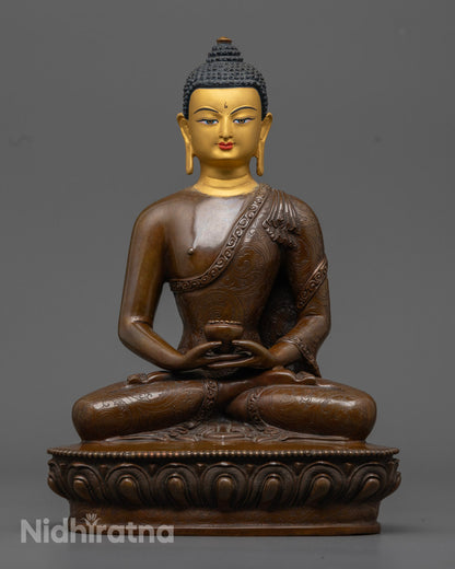 handcrafted Amitabha Buddha Statue made from oxidized copper with 24k gold-coated face, seated in serene meditation posture | symbol of infinite light and compassion.