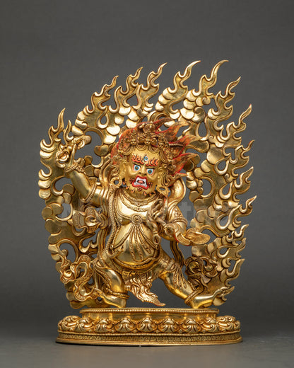 Front view of Vajrapani statue with third-eye face, bared fangs, and triple gold fire-gilding