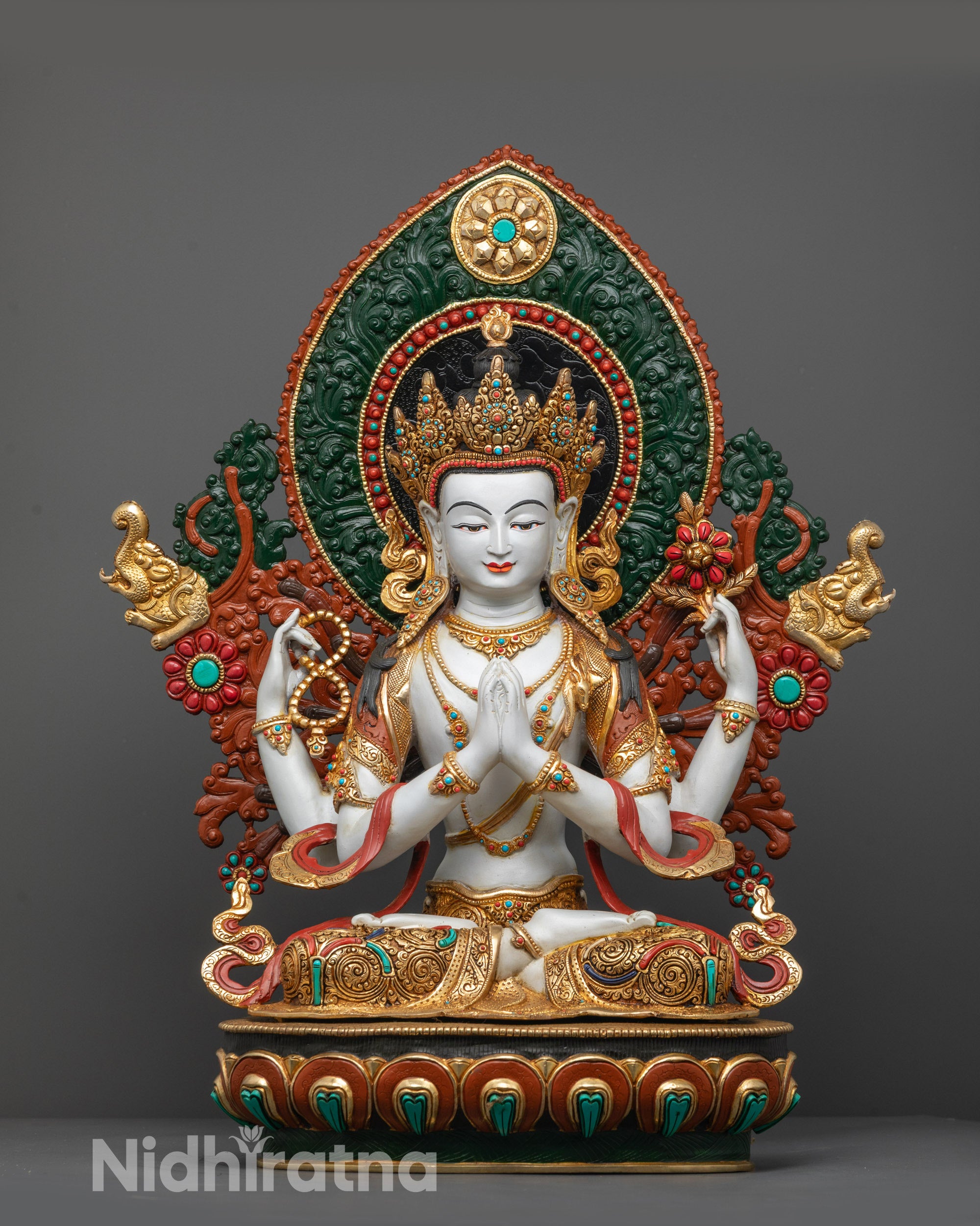 Front angle of Tibetan Chenrezig Statue with gold plating and lotus base details
