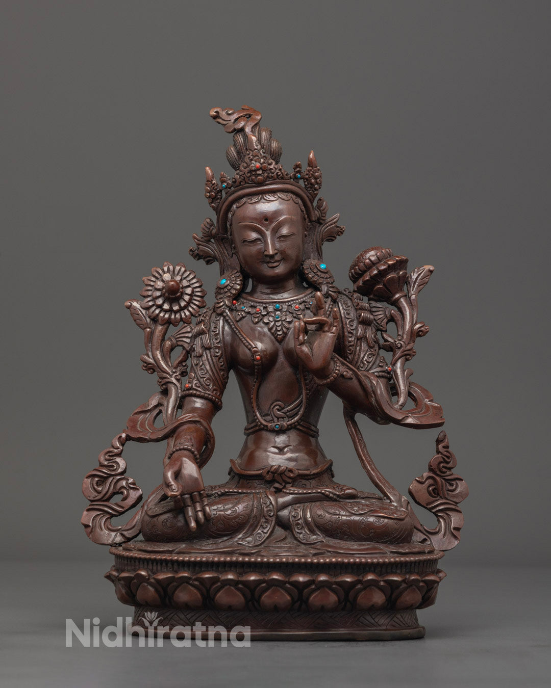 Front angle of oxidized White Tara statue showing serene meditation posture and sacred hand gestures