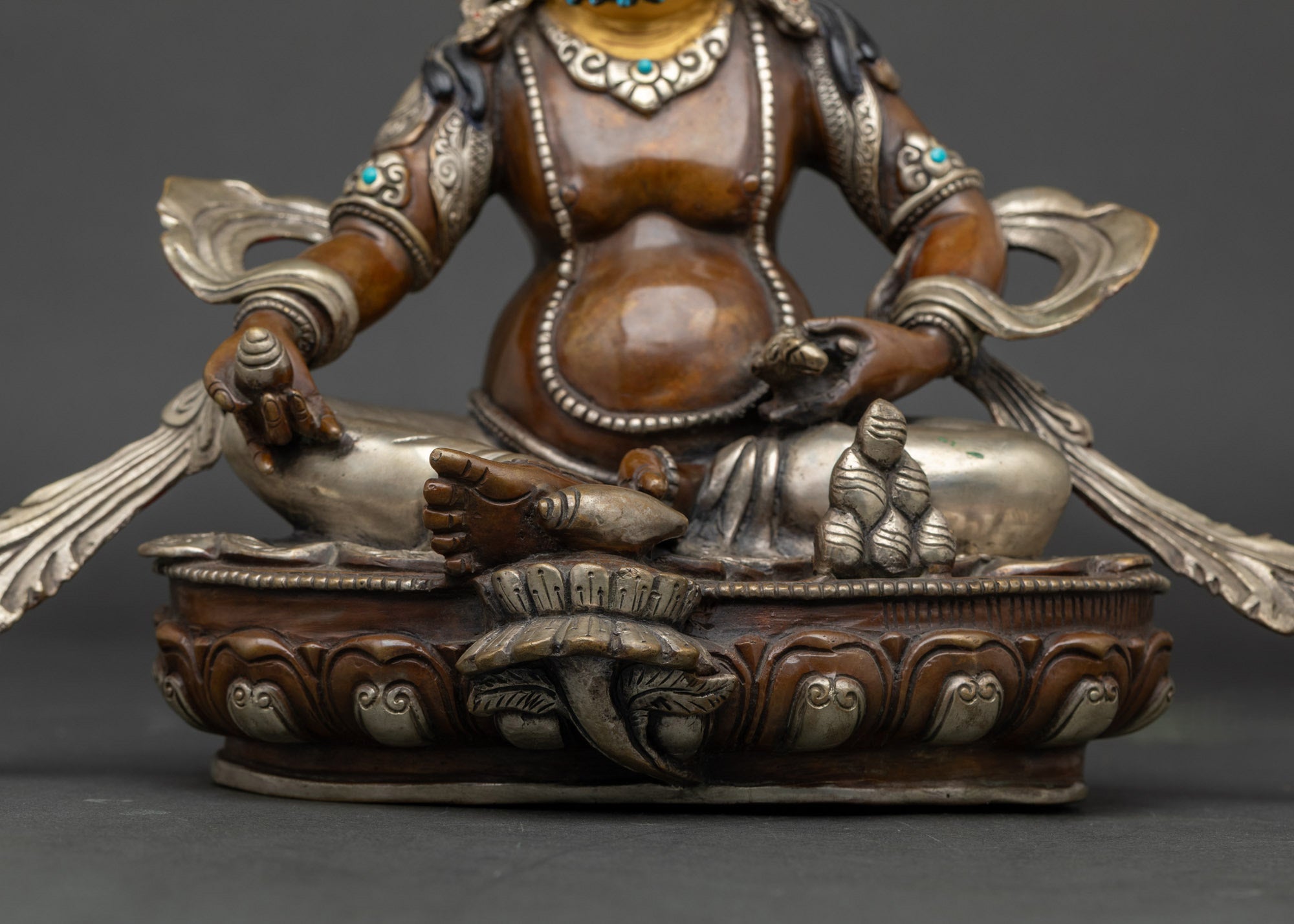 Front detail of Dzambhala Prosperity and Abundance deity, handmade Newari sculpture