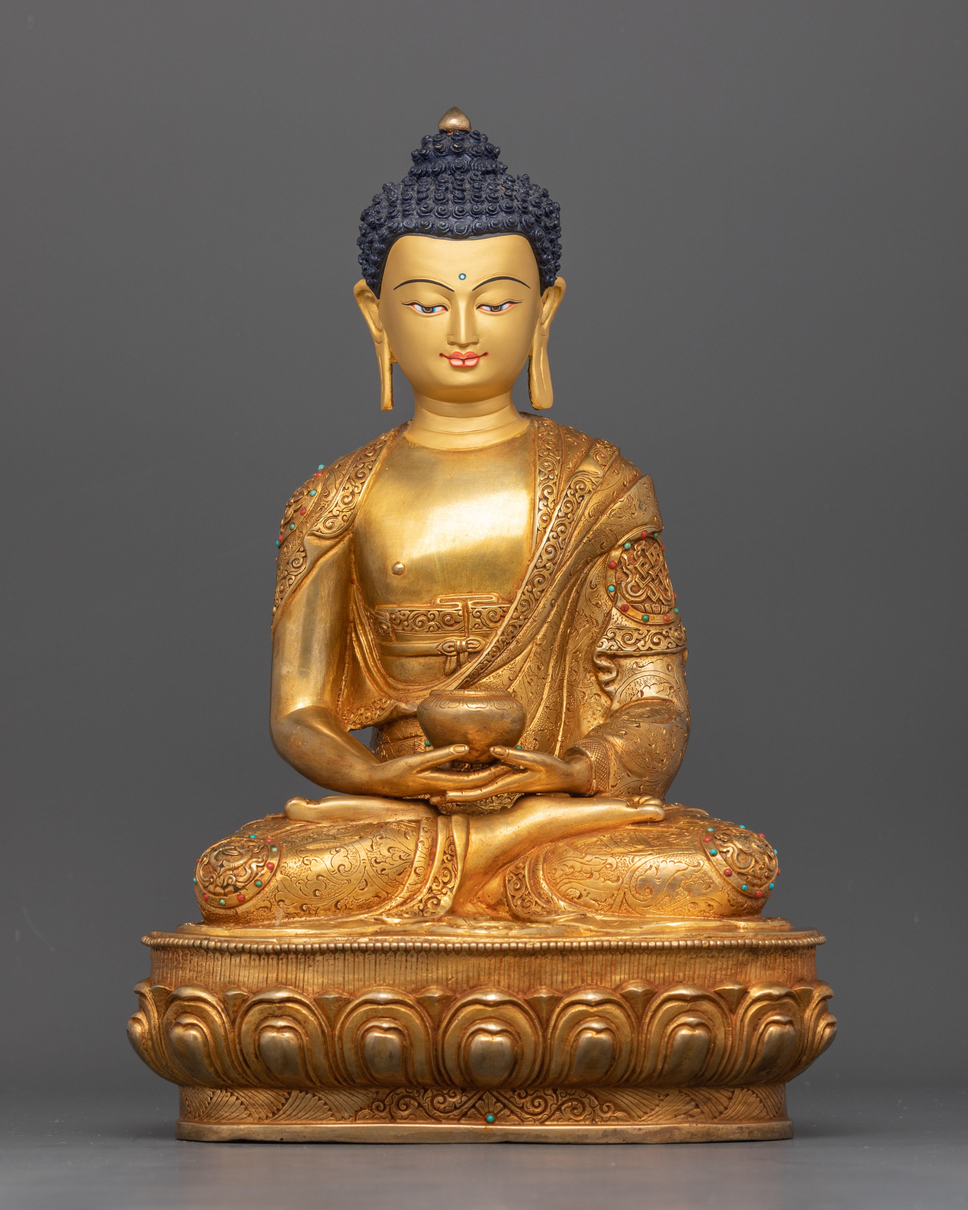 Front view Amitabha Buddha Statue on lotus pedestal with gold-painted face