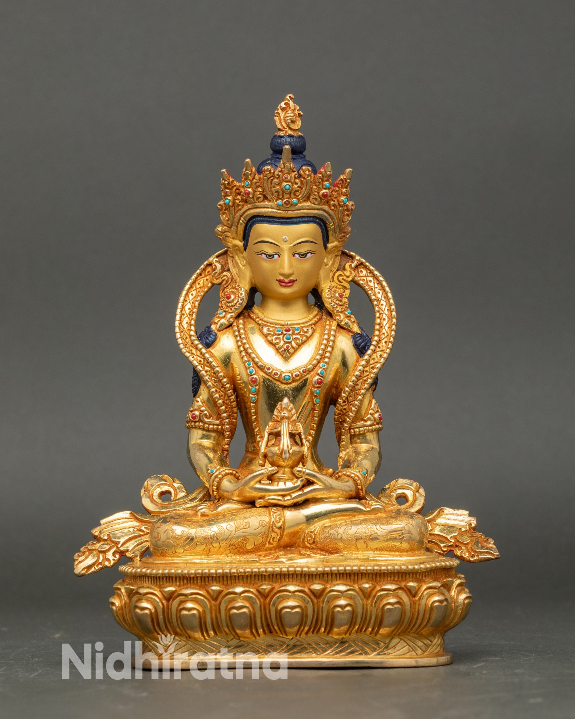 Front view Amitayus Buddha Statue on double lotus pedestal with gold face and stones