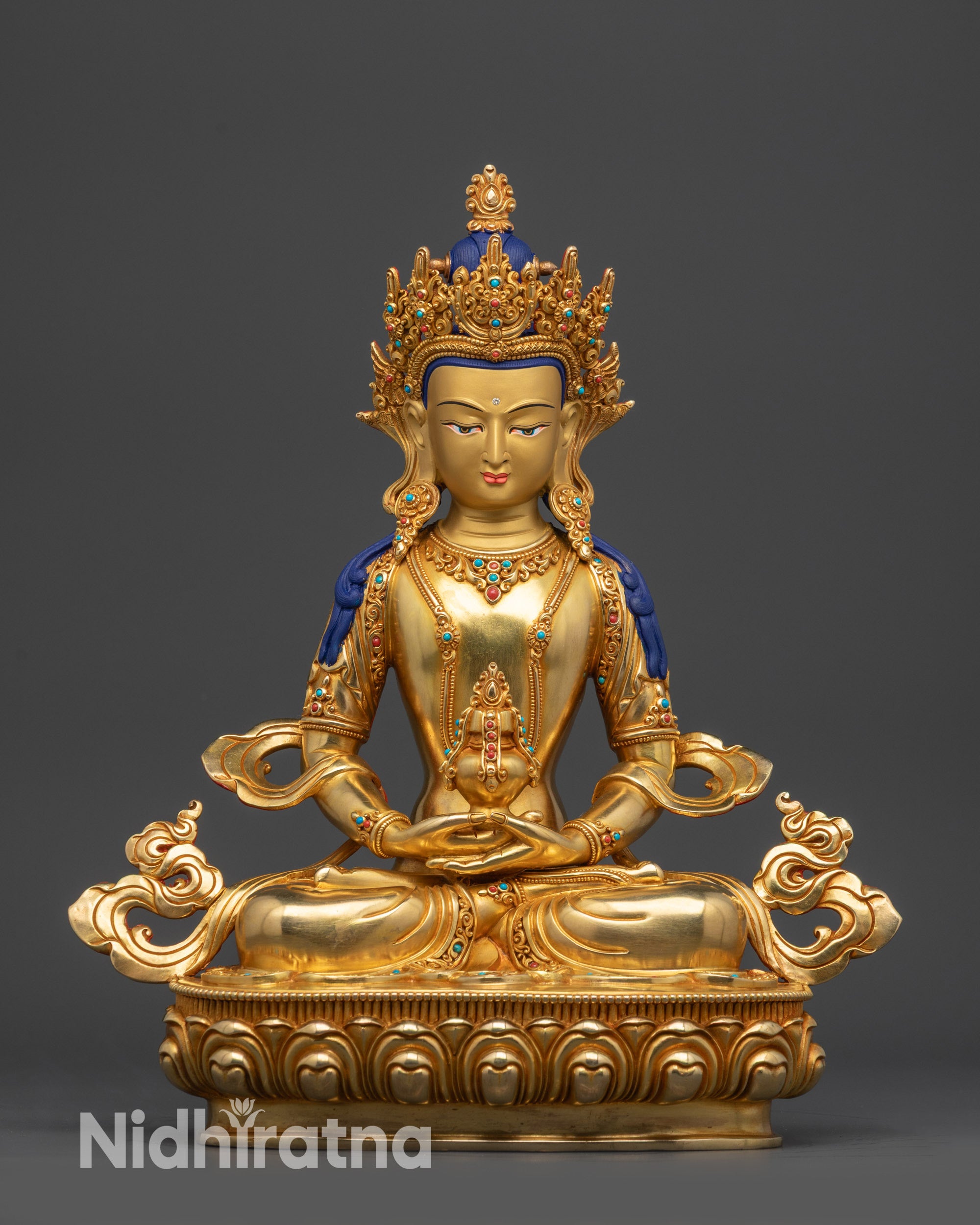 Front view Amitayus Statue gold-gilded Tibetan deity seated on lotus holding long-life vase
