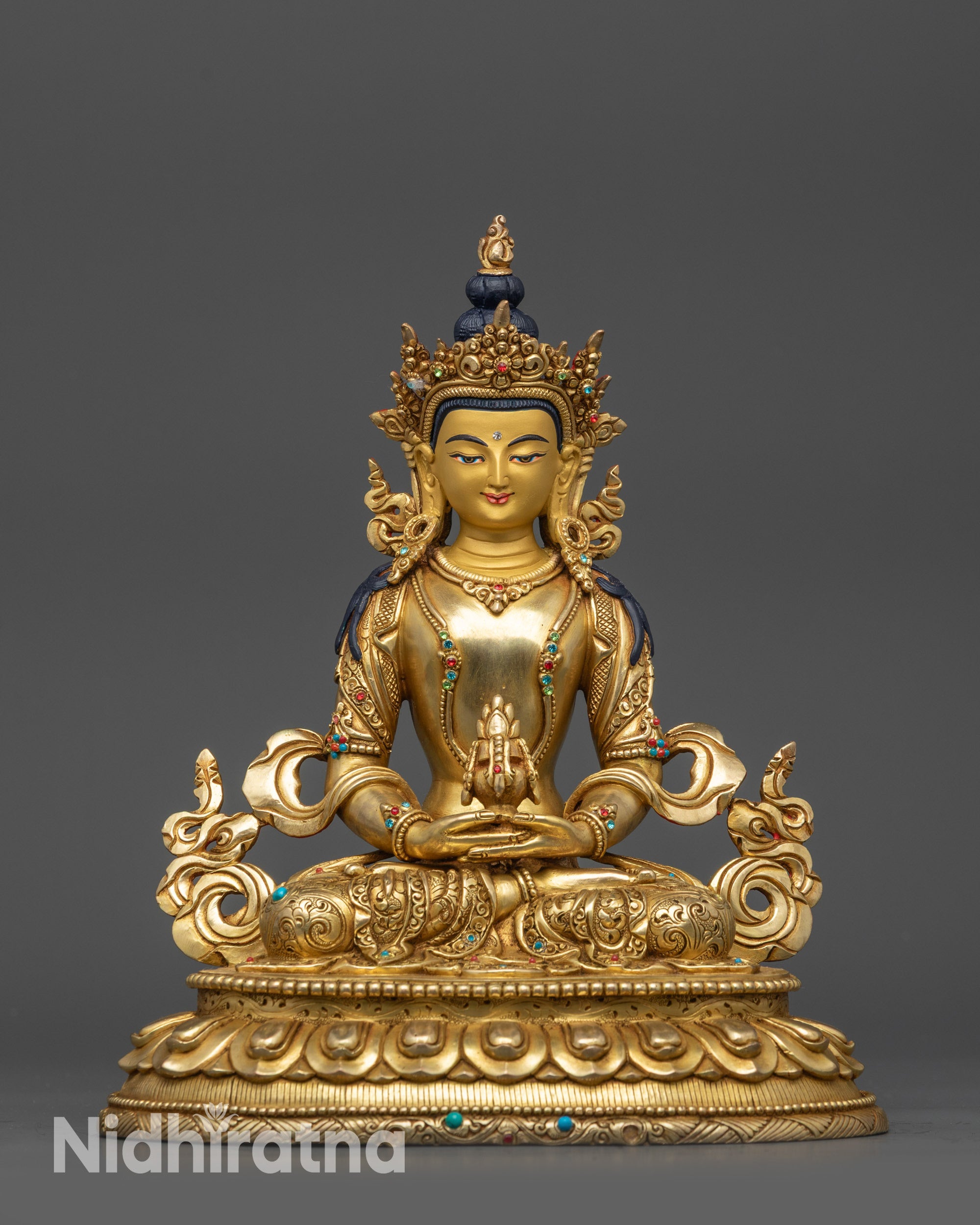 Front view Amitayus Statue with gold-gilded face and lotus seat