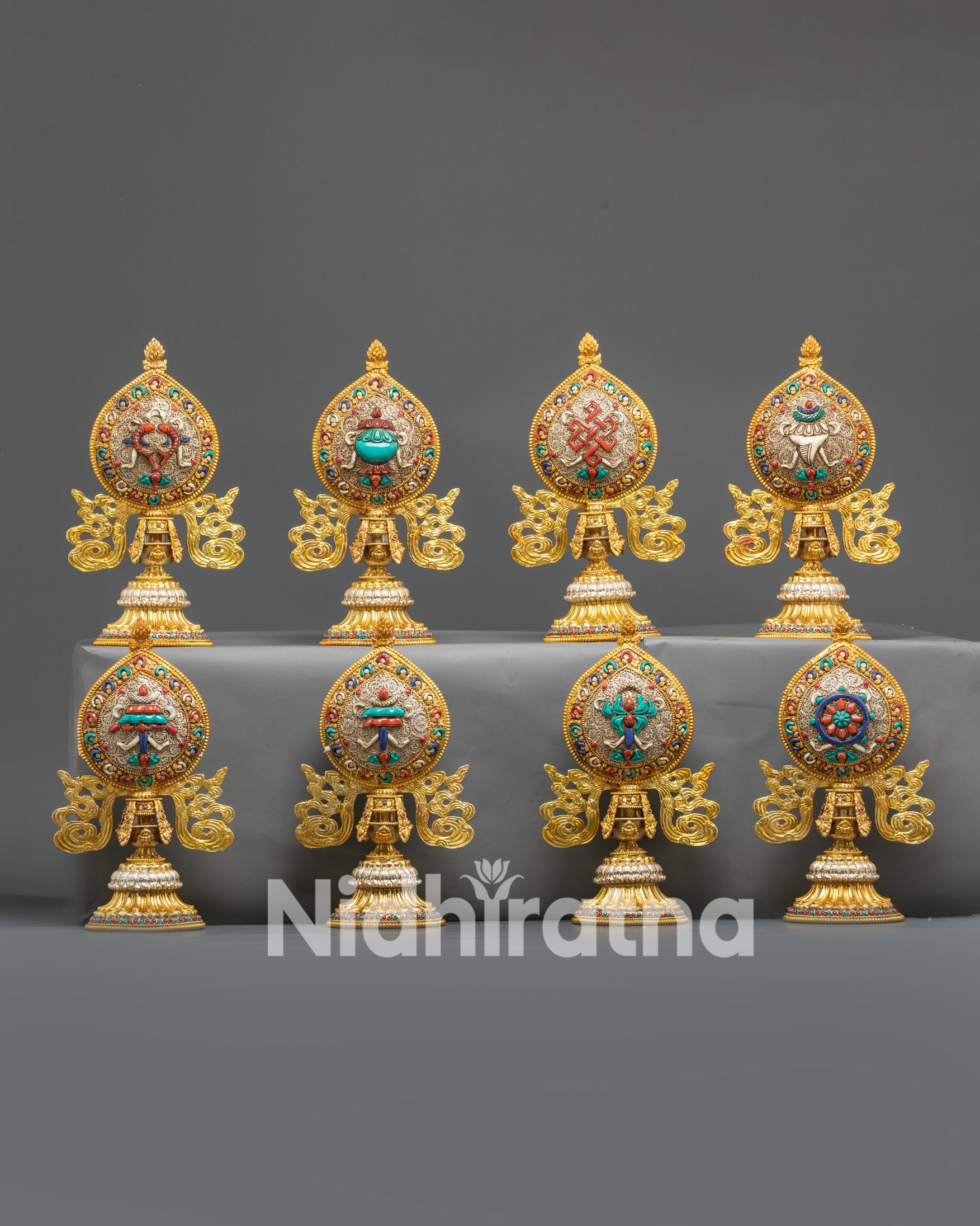 Front view Ashtamangala set showing all eight copper symbols with gold plating & stones