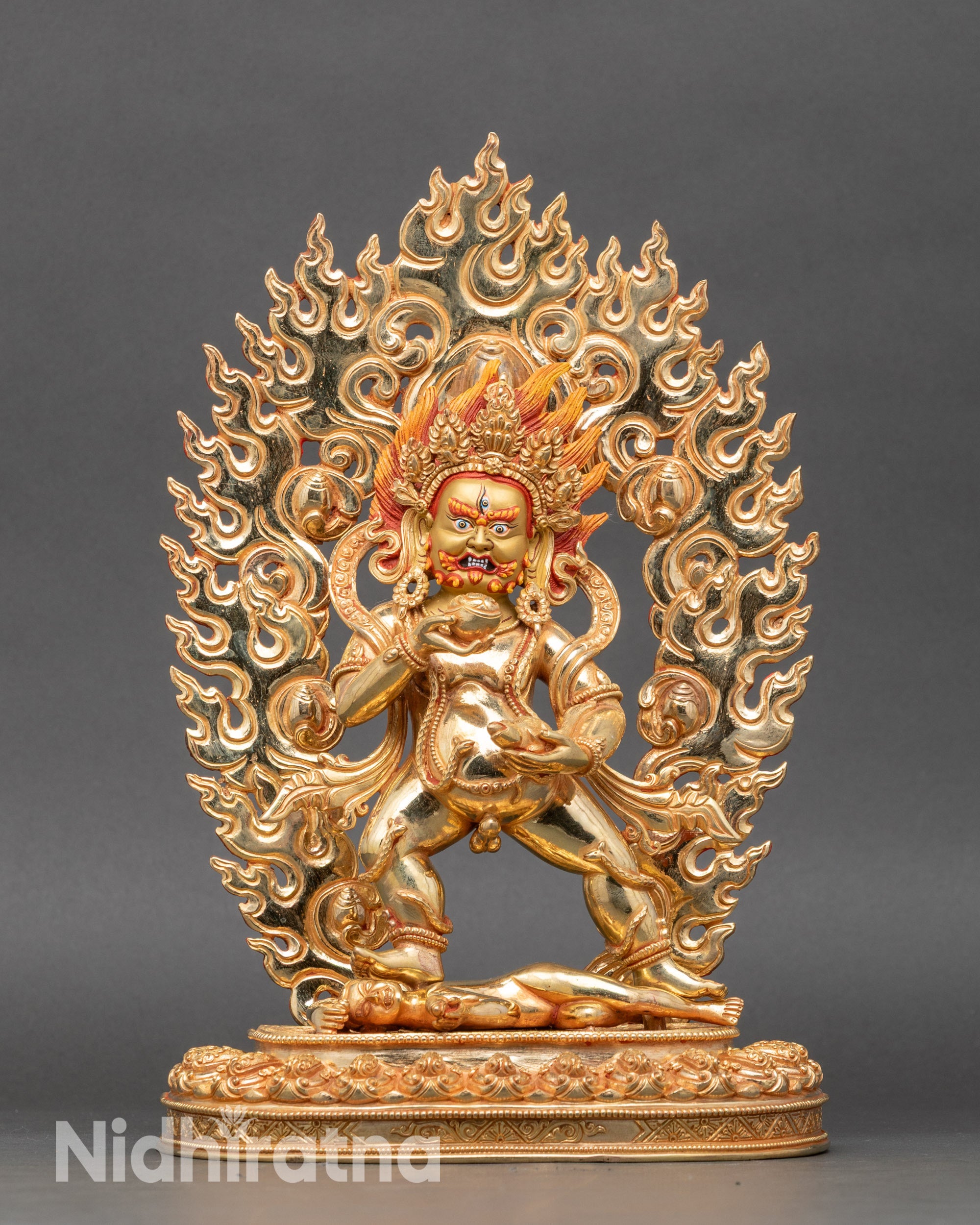 Front view Black Dzambhala statue 24K gold gilded copper Tibetan wealth deity Nepal