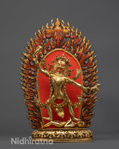 Front view Blue Tara Ekajati statue with gold-gilded face and fire-gilded body on copper base

